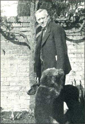 Lowry in his garden with his favorite dog “Taffy.”