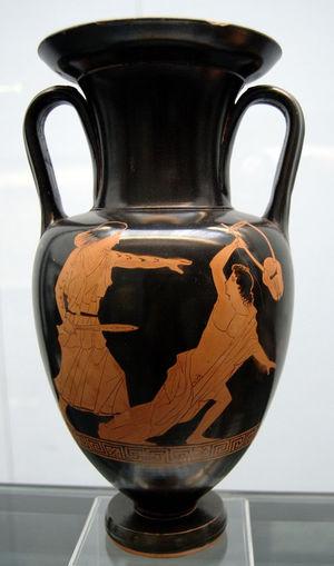 Greek Red-Figure vase (450-440 B.C.) depicting the death of Orpheus by a sword-wielding, Thracian maenad bearing tattoos with geometric patterns on her bare arms. Amongst Thracian men, tattooing of men served as a marker of high social status and nobility that clearly distinguished the aristocracy from the peasantry. Conversely, the Greek essayist Plutarch suggests that Thracian women (Maenads), whose name roughly translates to the “Mad Women” or “Raving Ones, had been tattooed by their husbands as a punishment for killing Orpheus. Despite their misgivings about the practice, Ancient Greeks were also fascinated by the idea of tattoos. As a result, within the iconography of vase painting in the 5th and 4th centuries B.C., Greek artists frequently illustrated Thracian women wielding swords, spears, daggers and axes. On these vases, the geometric tattoos on the women’s bodies draw attention to athletic strength and are used to accentuate musculature and motion.