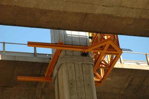 Fastening of the auxiliary metal structure to the concrete pier.