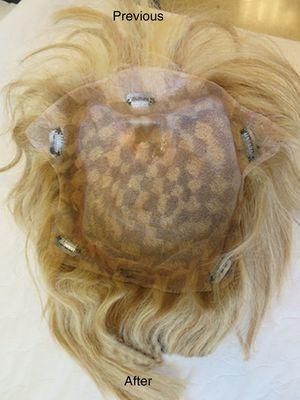 The underside of the wig with 5 fasteners.
